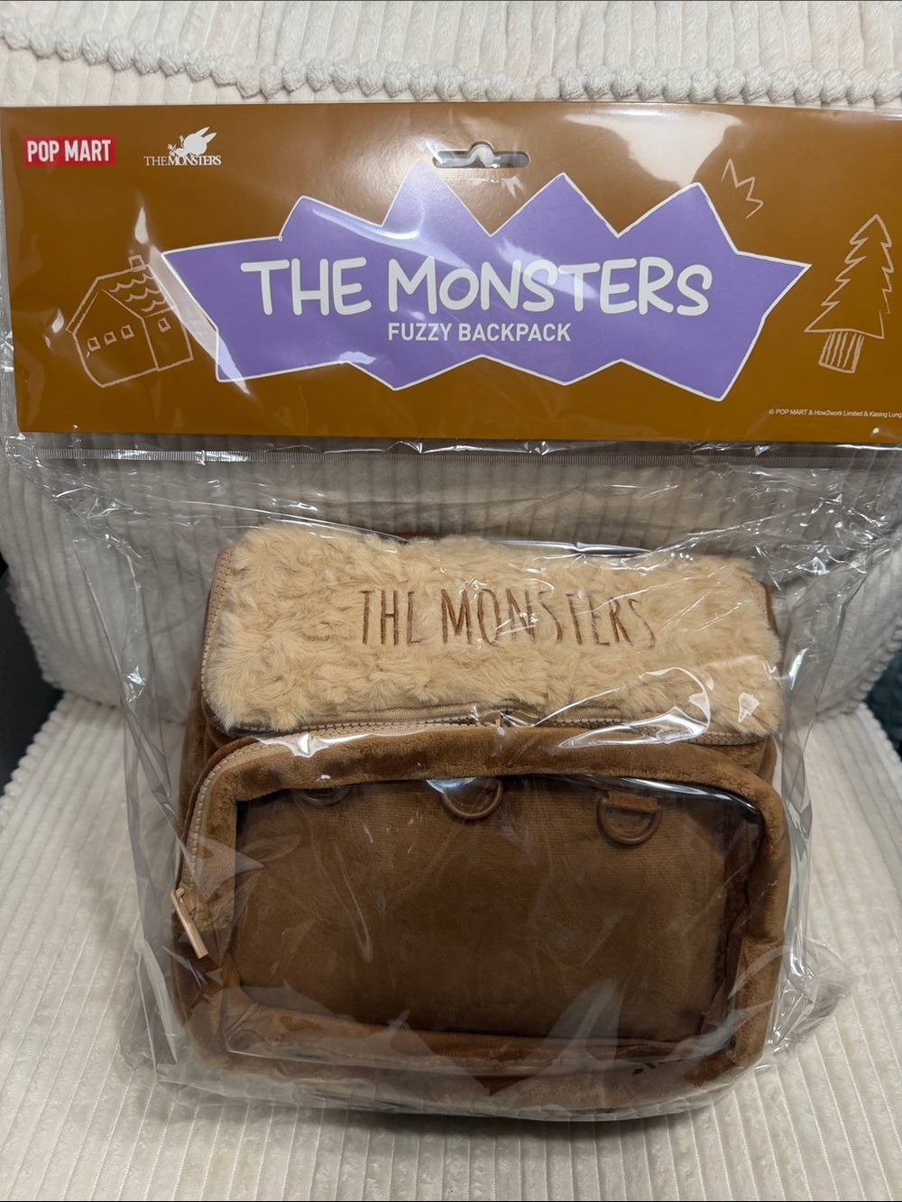 The Monsters Fuzzy Backpack - Membership Exclusive. New in packaging.